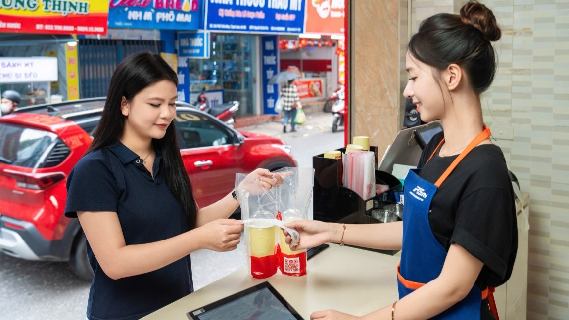 iPOS.vn bắt tay GrabFood giải bài toán vận hành đa kênh F&B